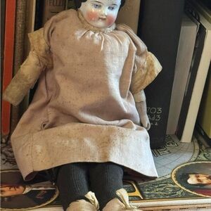 Vintage Porcelain Doll with Cream Dress